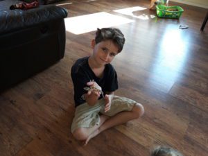 Jojo holding his gecko